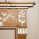 Victorian antique fireplace in tarred pine and sculpted gesso.