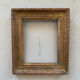 Small old oriental golden frame
