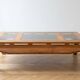 Coffee table in solid cherry wood with glass tops.
