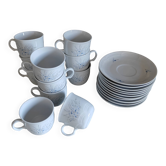11 cups and saucers