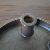 Candle holder made of stoneware with a harefur glaze