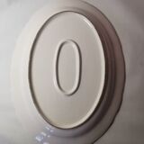 Ceramic dish decorated with peacock folk art Asian motif