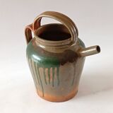 Glazed stoneware jug with drips
