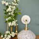 Vintage glass wall lamp with a white Clichy shade.