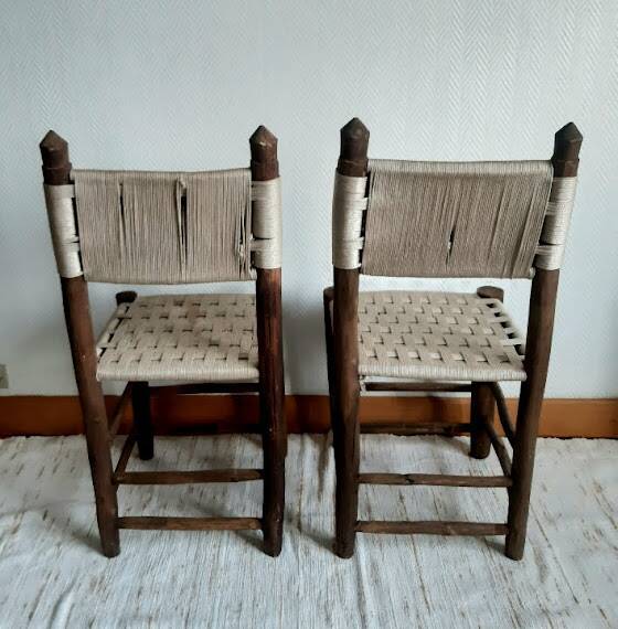 Brutalist wooden and rope chairs