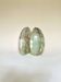 Pair of "egg" bookends in green onyx.