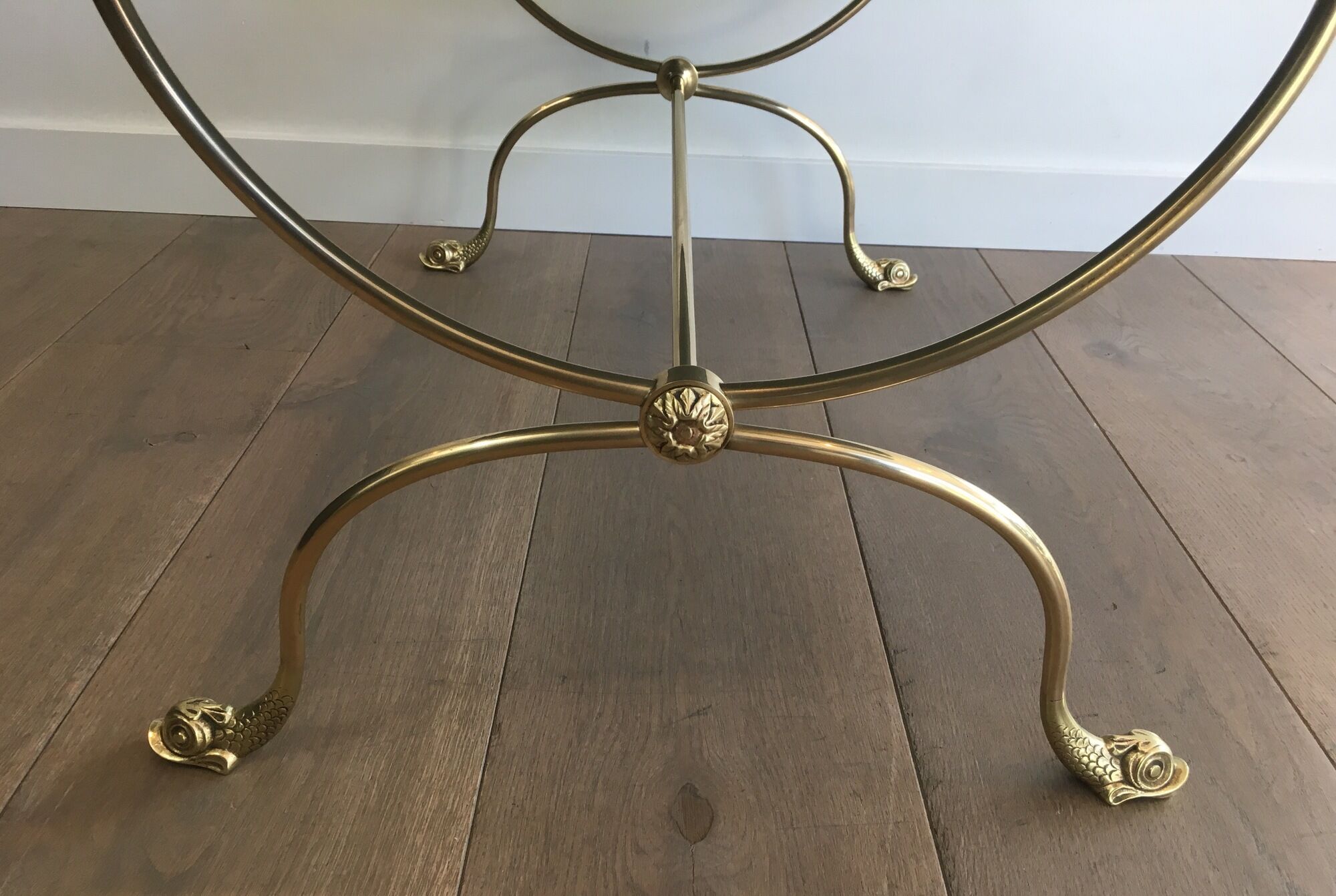 Neoclassical brass style coffee table with dolphin head decoration