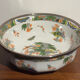 Shallow porcelain dish from Limoges Raynaud, bird decoration.