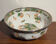 Shallow porcelain dish from Limoges Raynaud, bird decoration.
