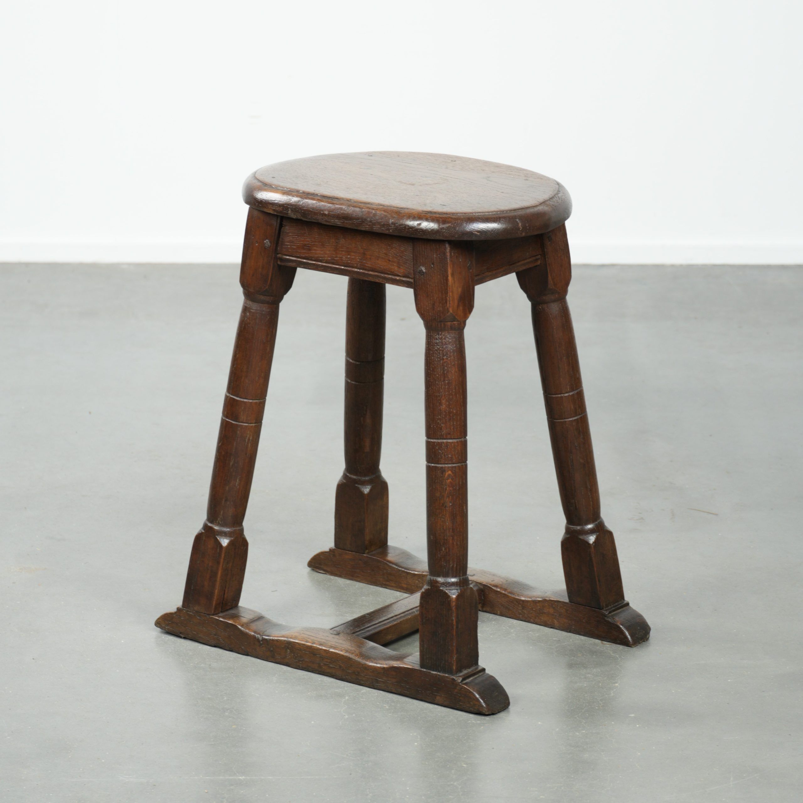 Antique Dutch oak stool from the early 19th century with a nice design