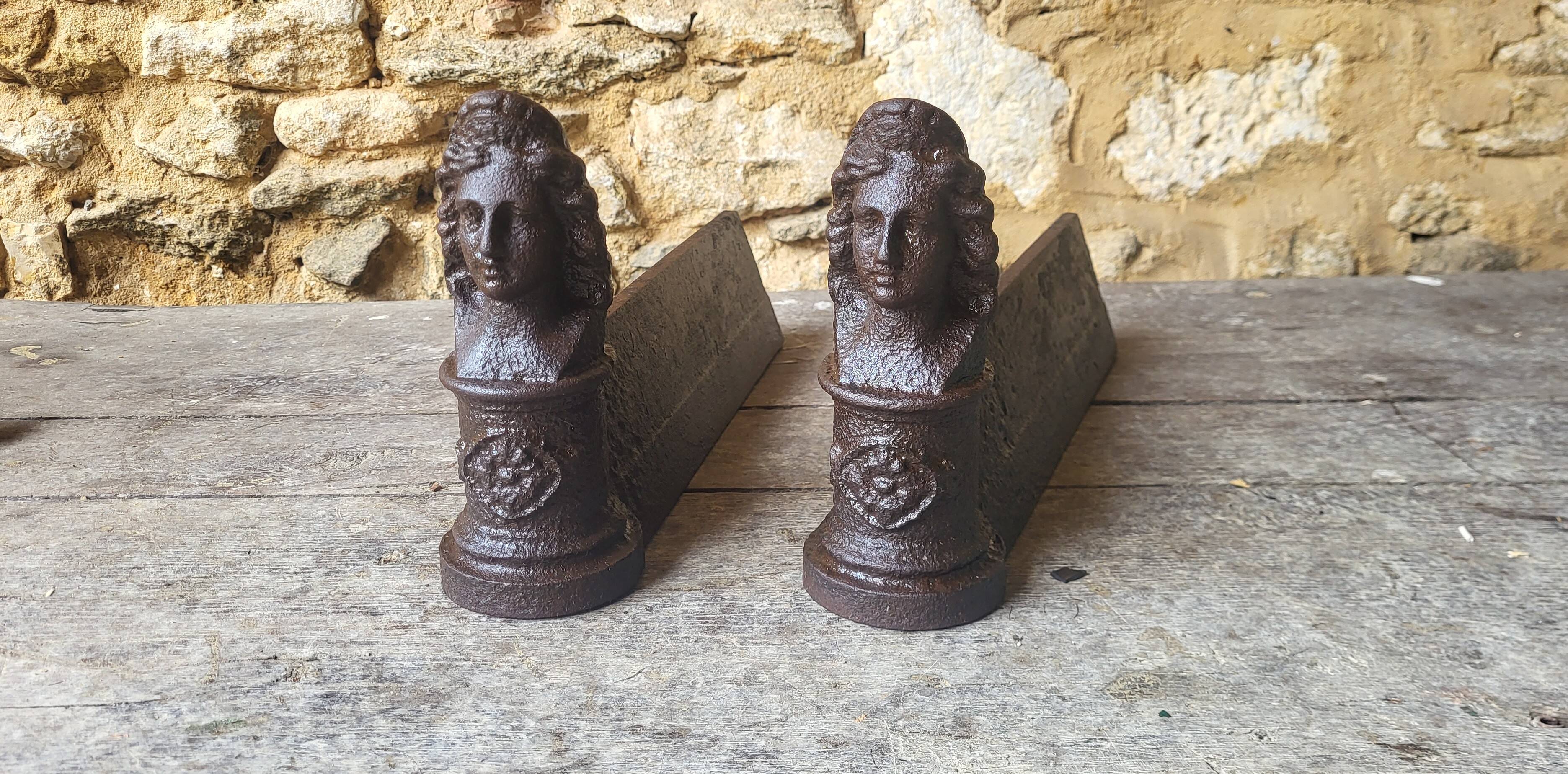 Pair of cast iron andirons from the 19th century