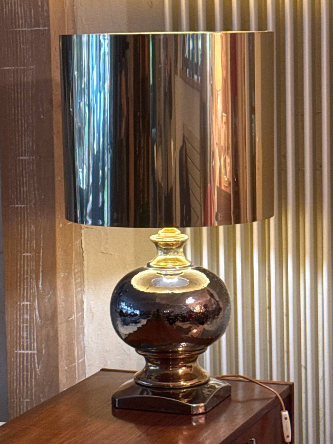 Beautiful ceramic base lamp with a golden metal shade.
