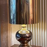 Beautiful ceramic base lamp with a golden metal shade.