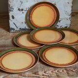 Six vintage stoneware plates with green net