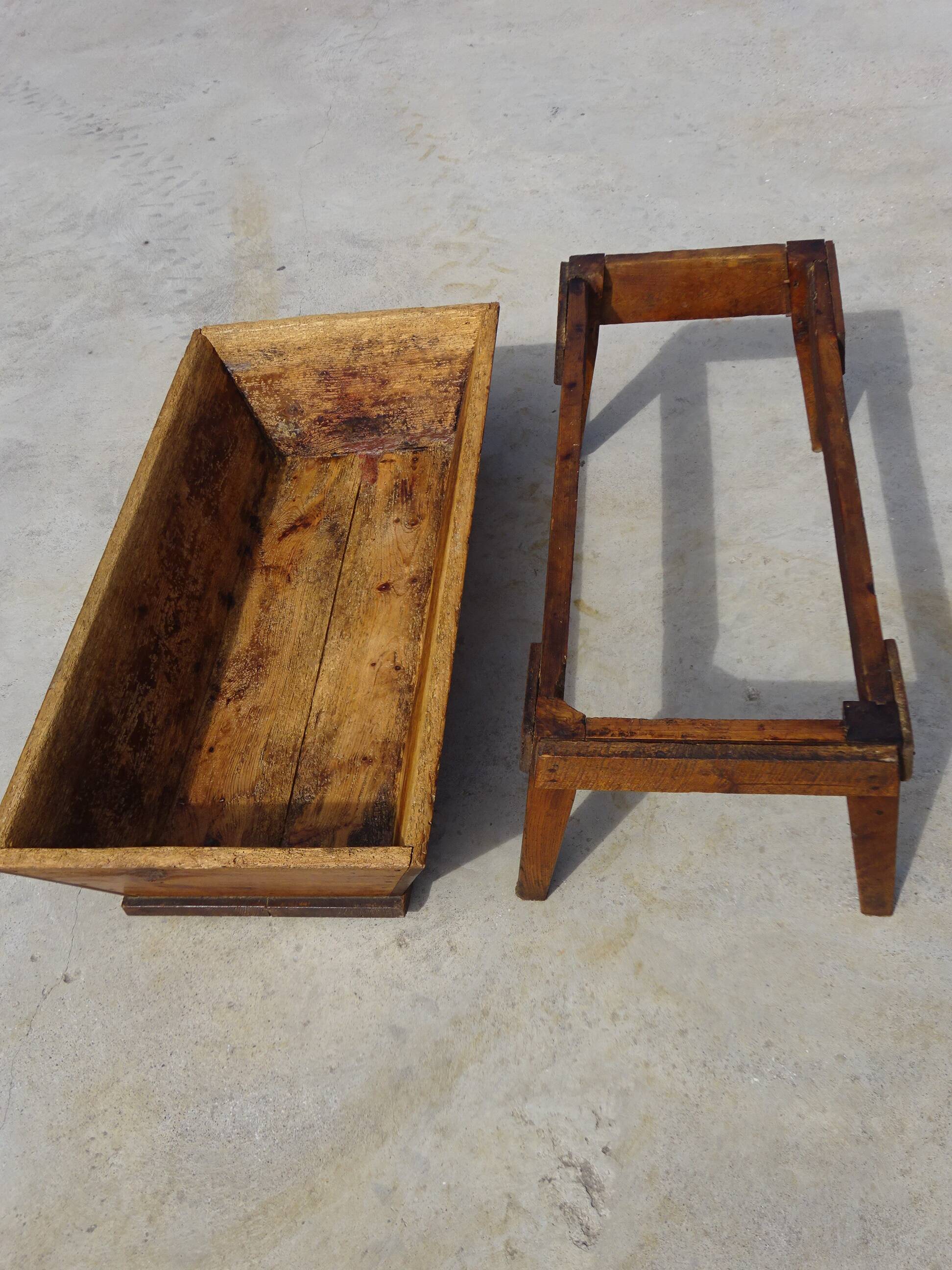 Very old solid oak dough trough with a lid and removable legs.
