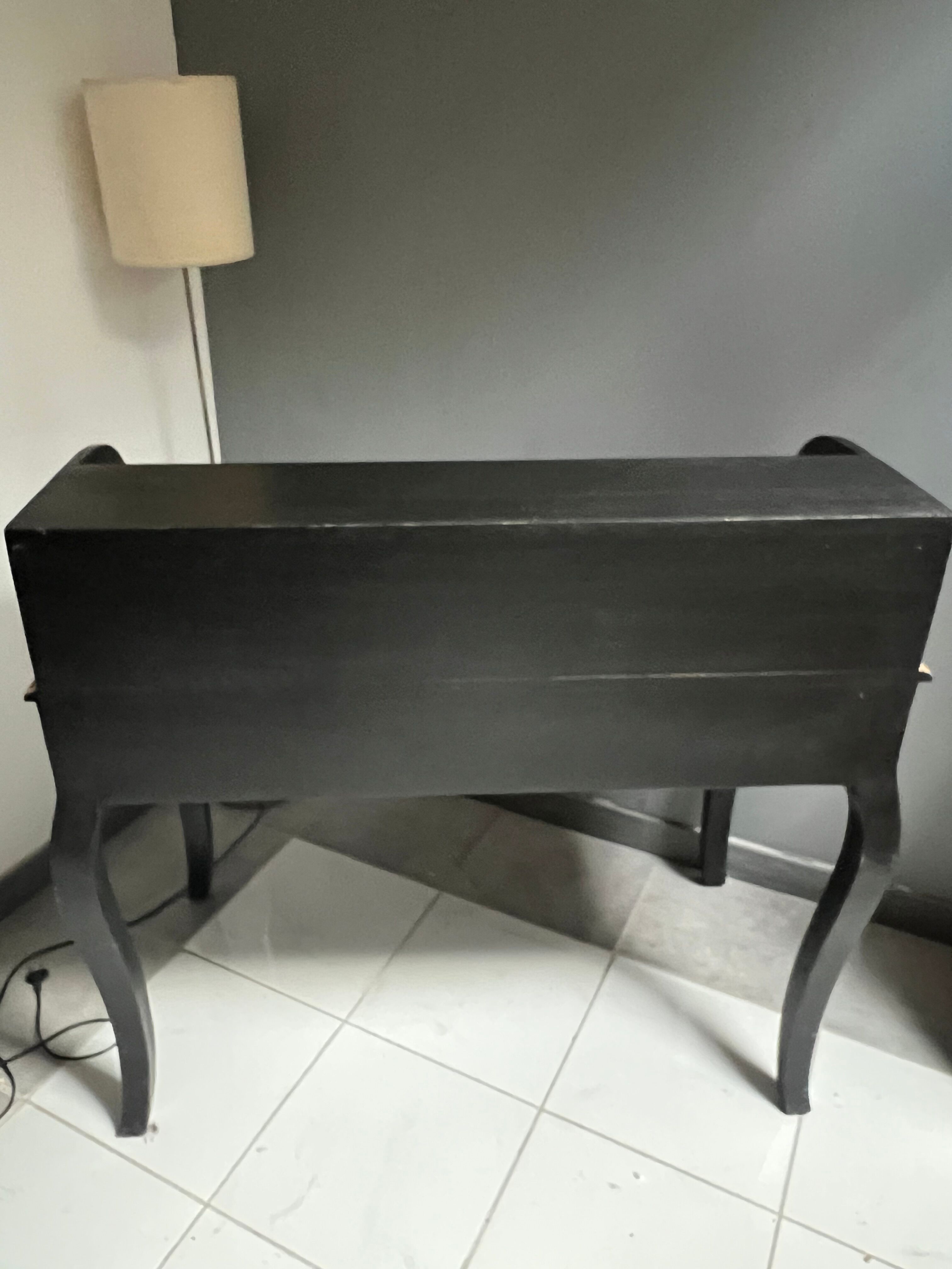 Black stepped wooden desk