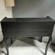 Black stepped wooden desk
