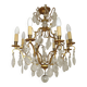 French Louis XV chandelier with 8 lights in gilded bronze, glass and crystal.