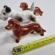 Set of three porcelain puppies