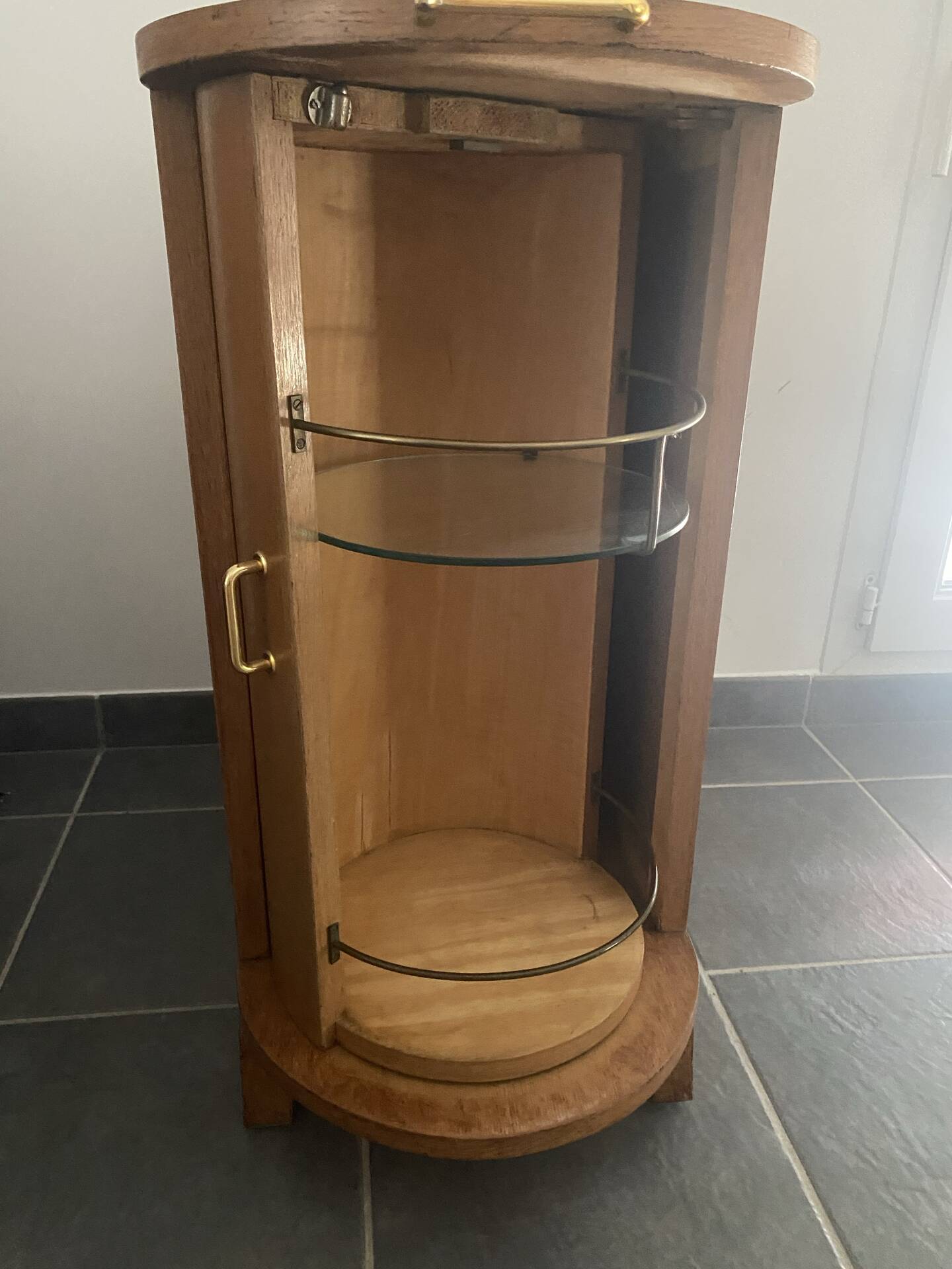 Rotating wooden bar cart from the 1950s.
