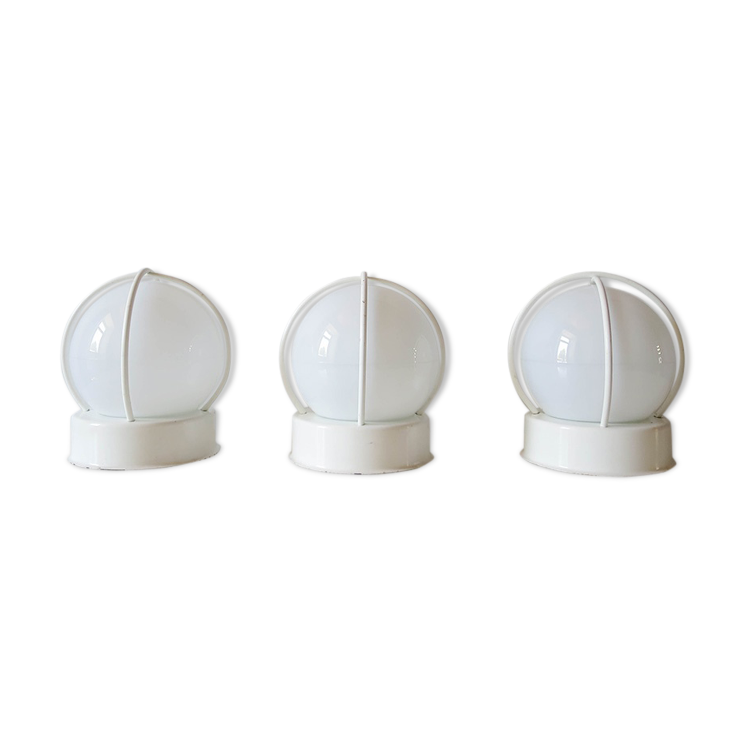 Lot of three globe wall sconces