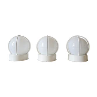 Lot of three globe wall sconces