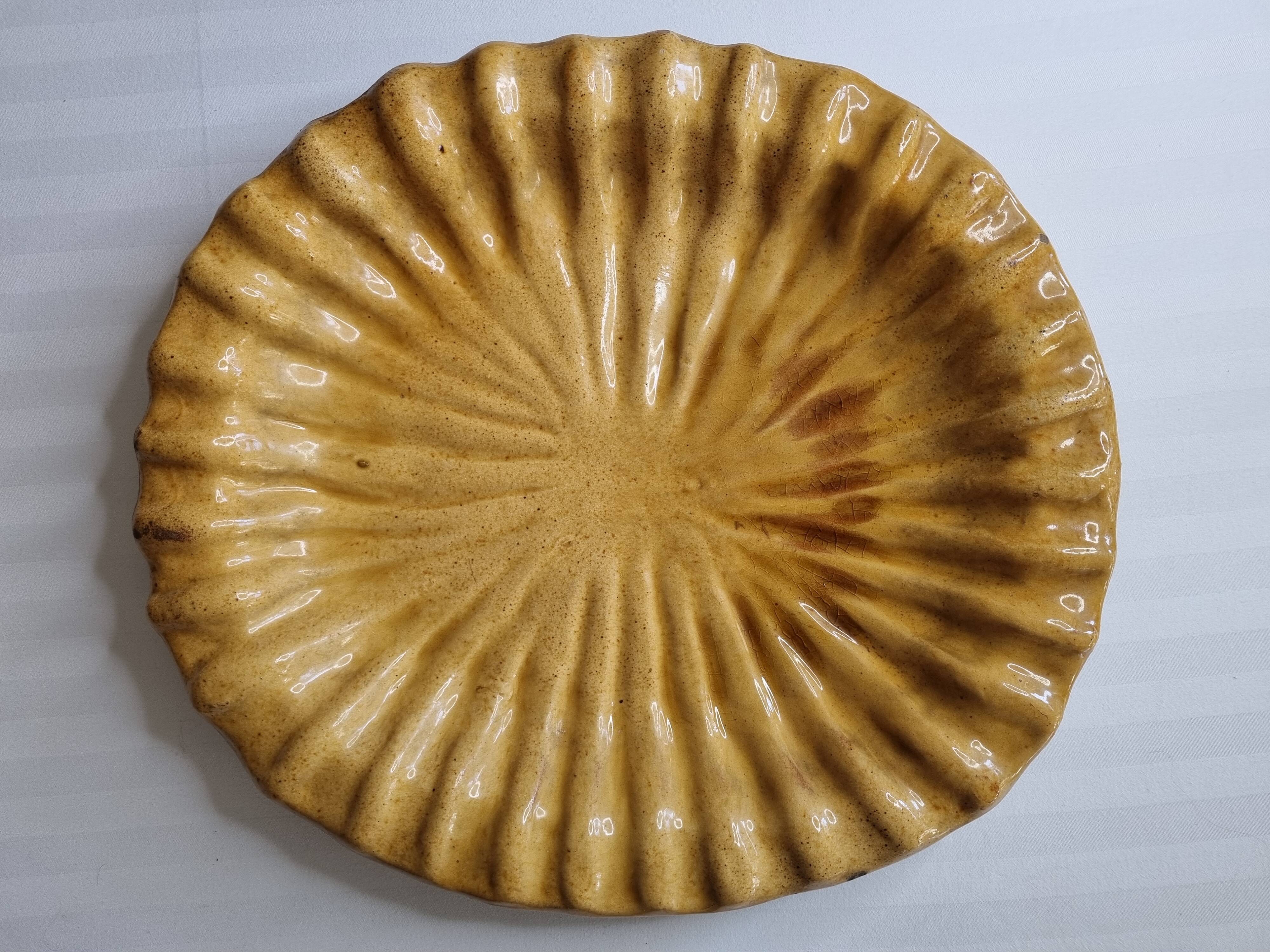 Large dish in enamelled terracotta, ochre, 47 cm