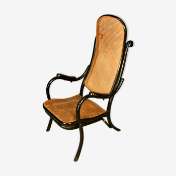 Fauteuil de repos canné en bois courbé