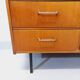 Vintage teak and black metal row from the 60s