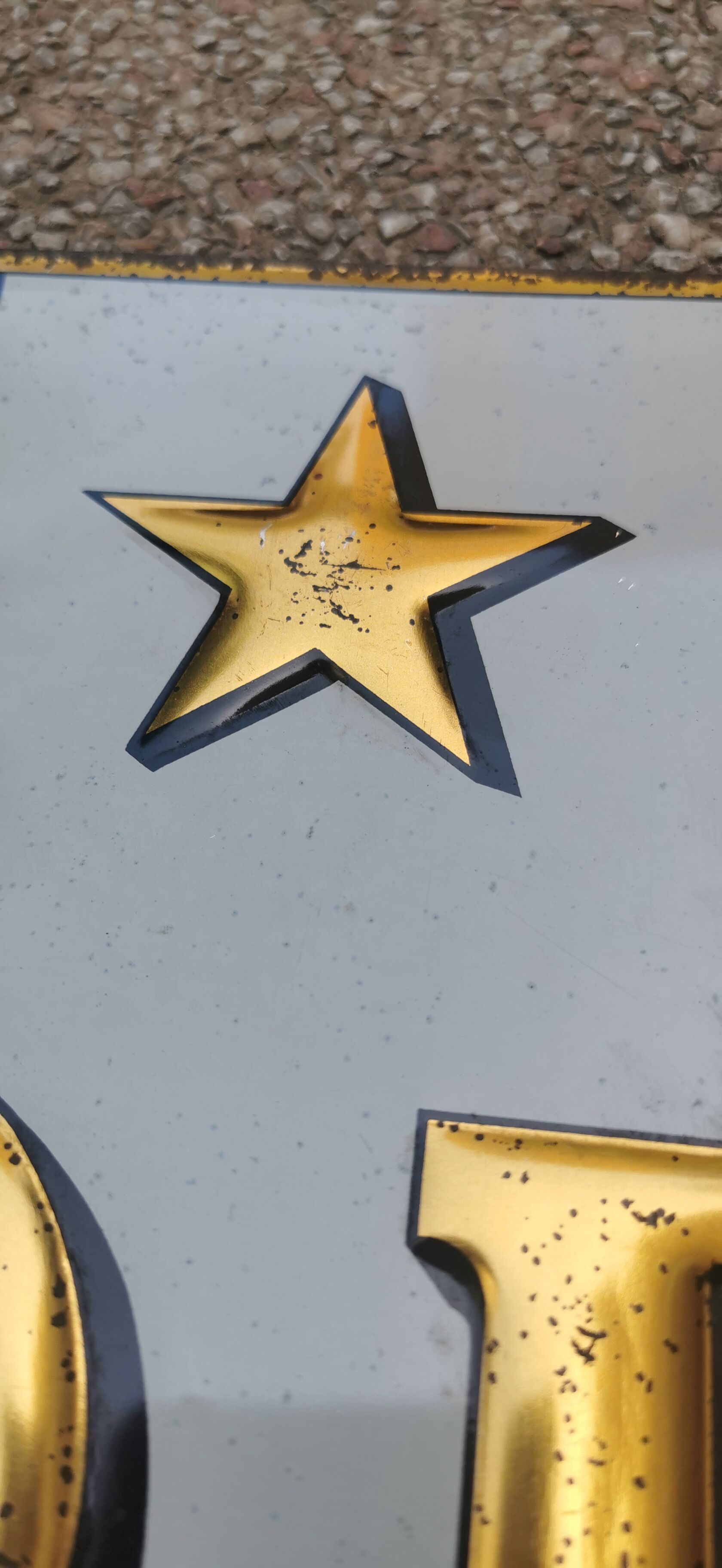 Sheet metal plate carries the flag of the French Republic