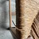Set of 6 sculpted oak chairs with straw seats – 1950s