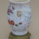 Vase en faïence décor papillon