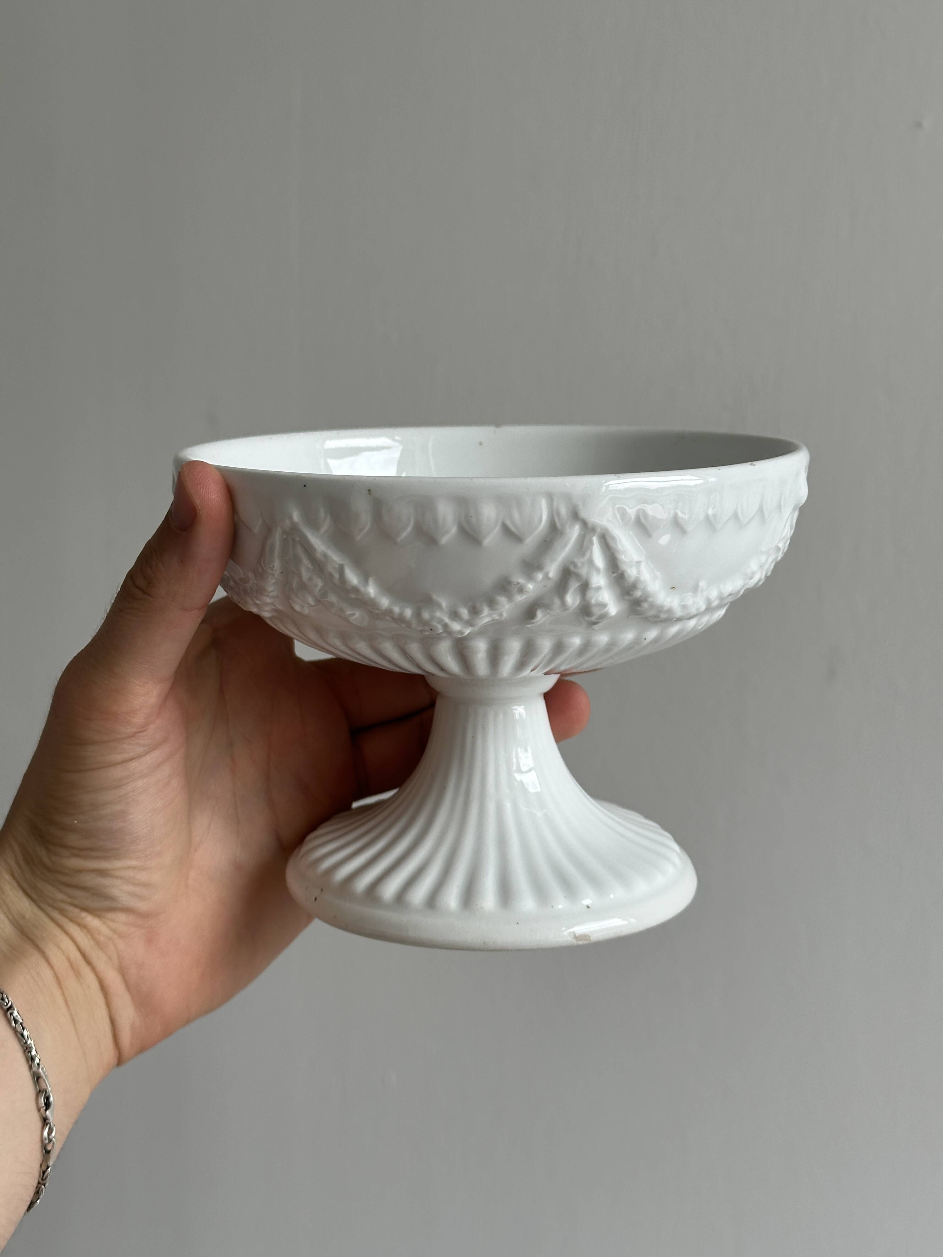 Decorated white porcelain cup
