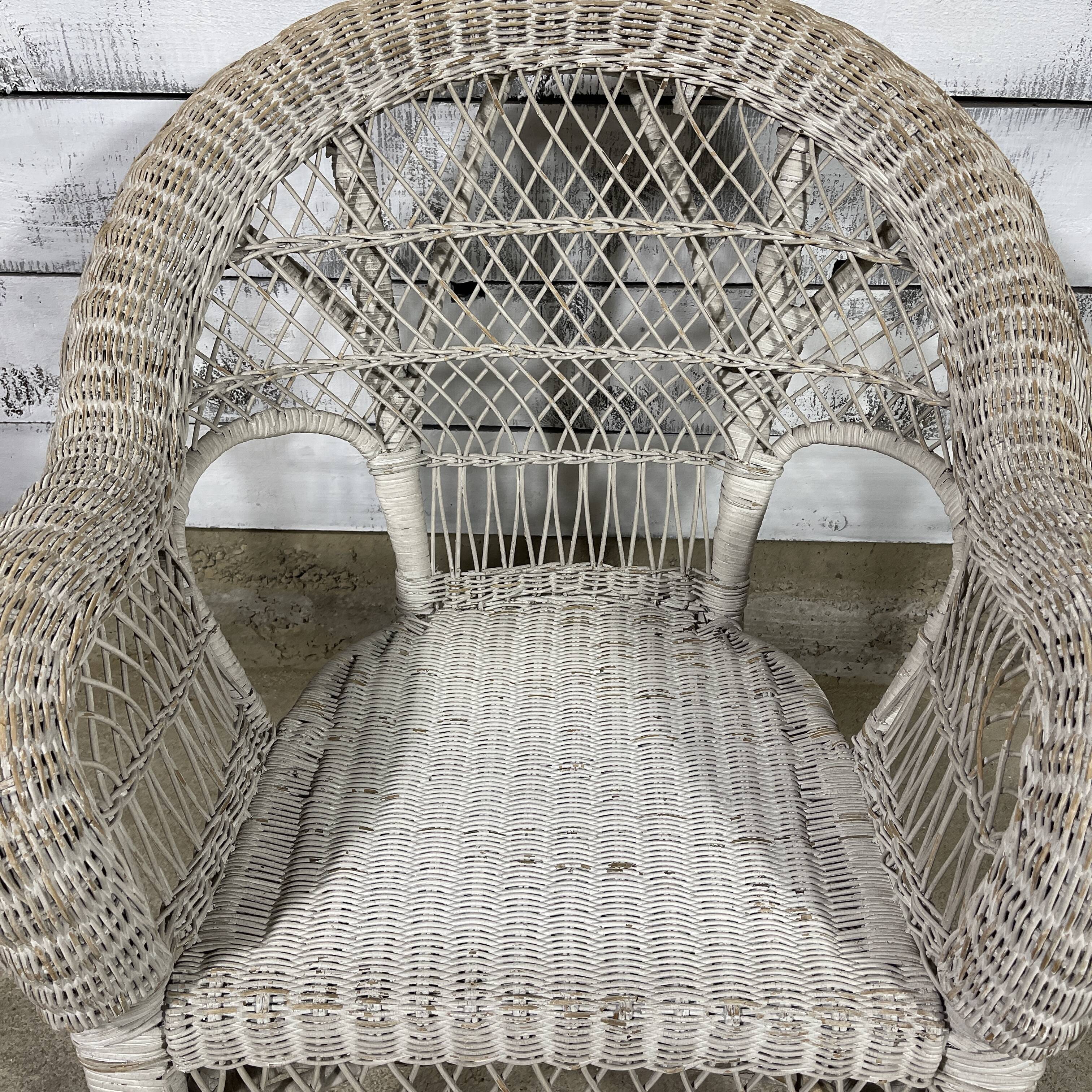 Vintage white rattan armchair