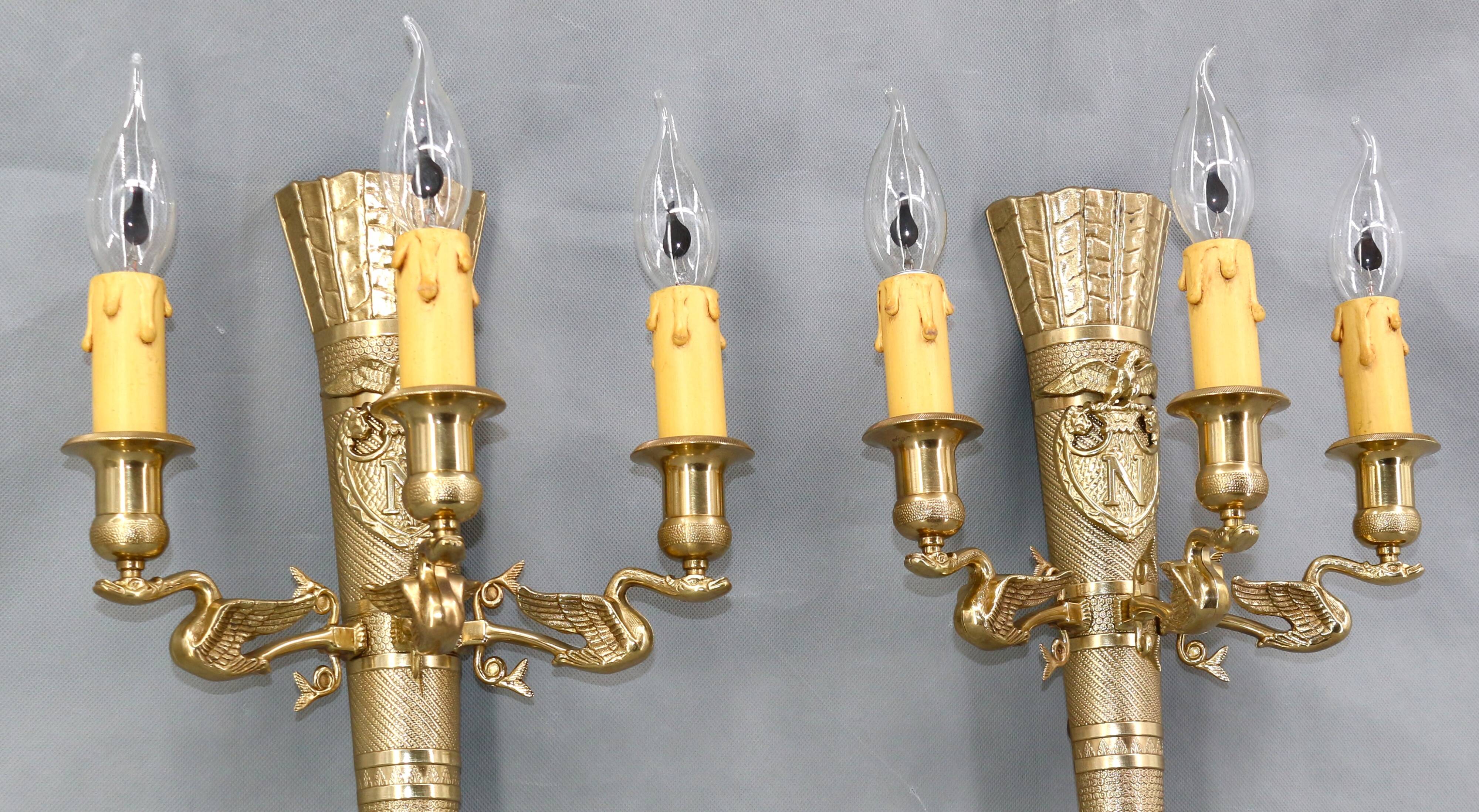 Large pair of Napoleonic gilt bronze empire style wall lights with three candles