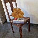 Wooden and cane chair. Carved wooden chair with cane seat.
