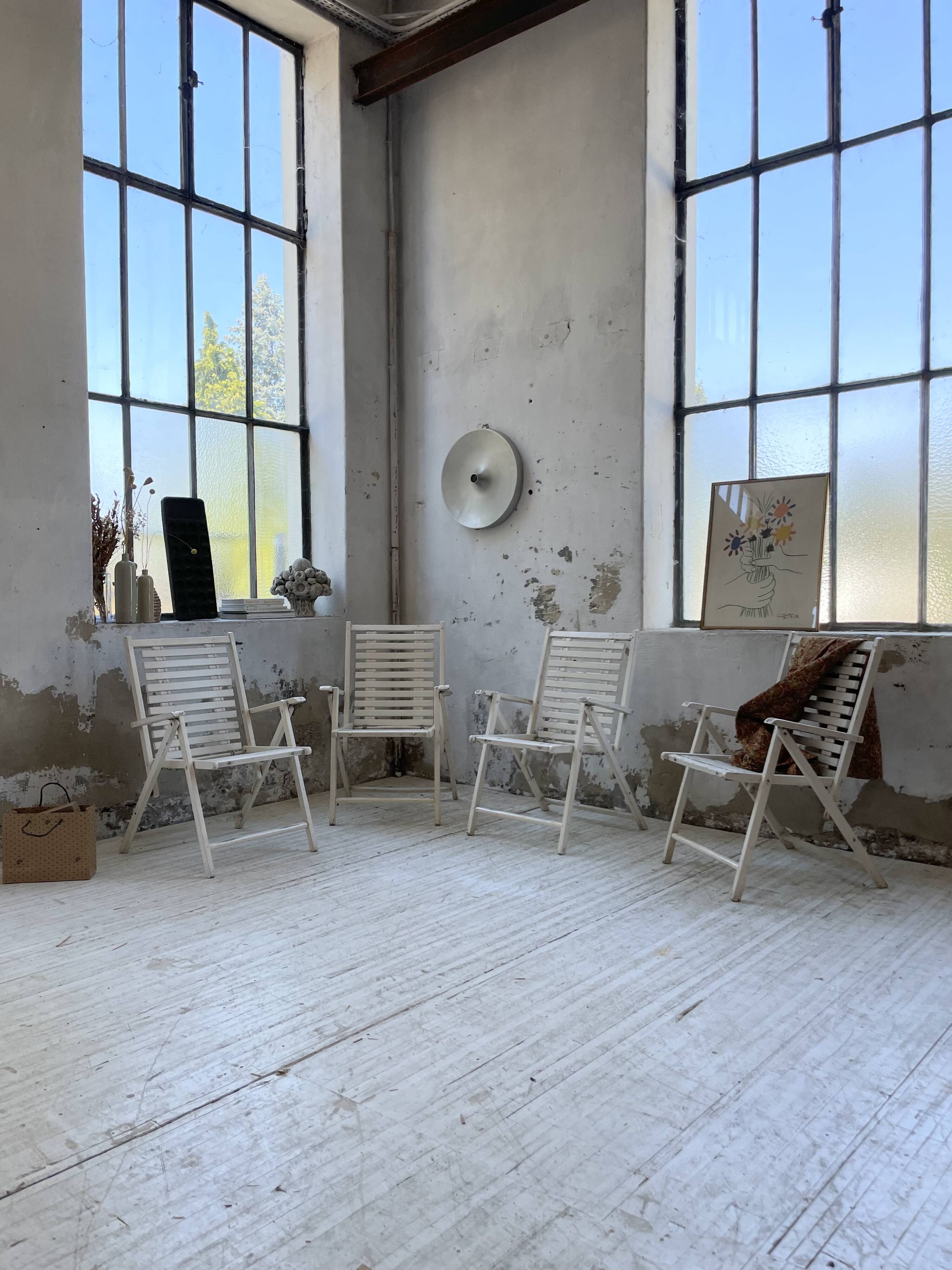 4 white wooden garden chairs