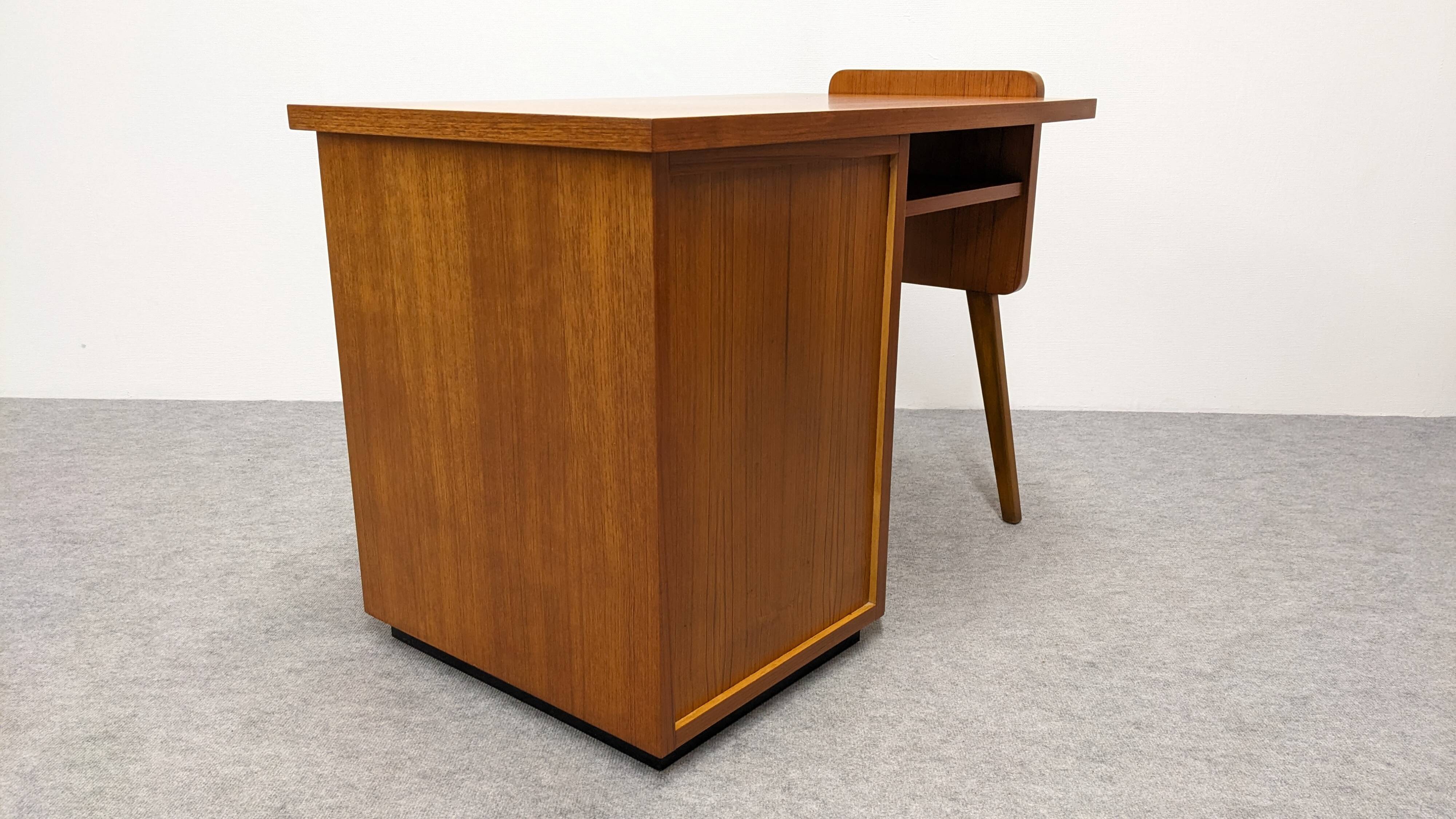 Modernist desk in blonde rosewood, France circa 1960.