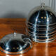 Suite de 8 cloches en inox service de table XXe