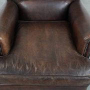 Characterful sheep leather armchair with a beautiful deep colour