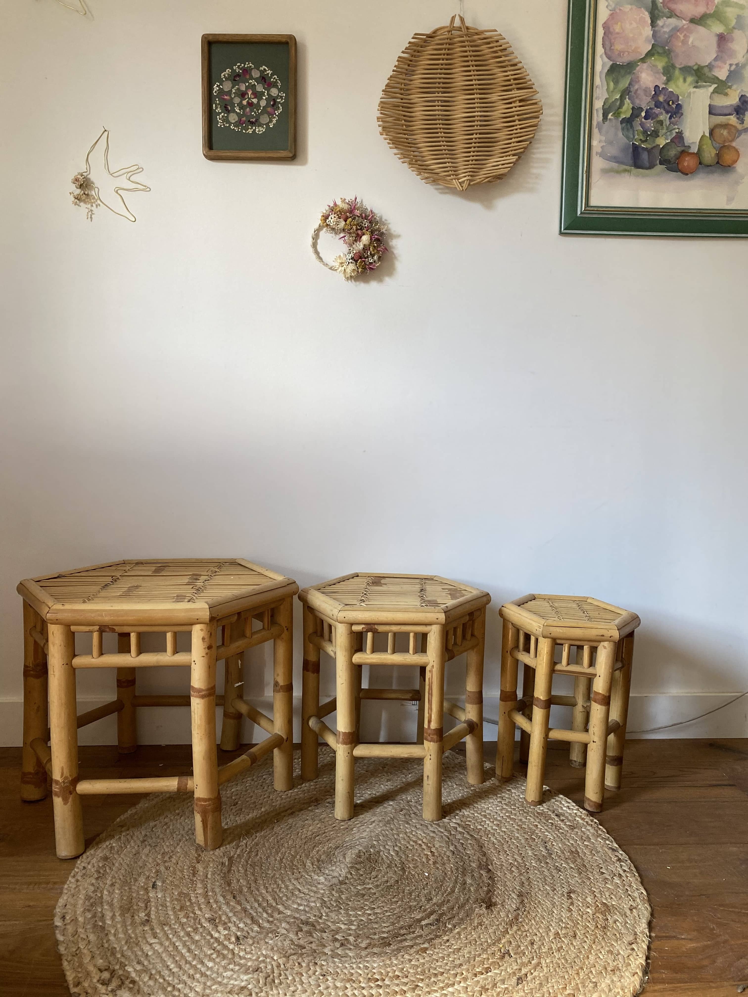 Set of three vintage rattan side tables.