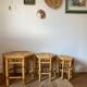 Set of three vintage rattan side tables.