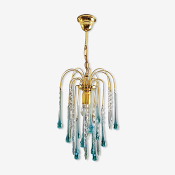 Luster has pendants in the form of drops in blue glass