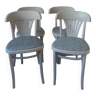 Set of 4 vintage bistro chairs from the 1970s. Curved beech chairs with pearl gray patina.