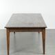 Large rustic dining table made of atmospheric elm wood with fine details