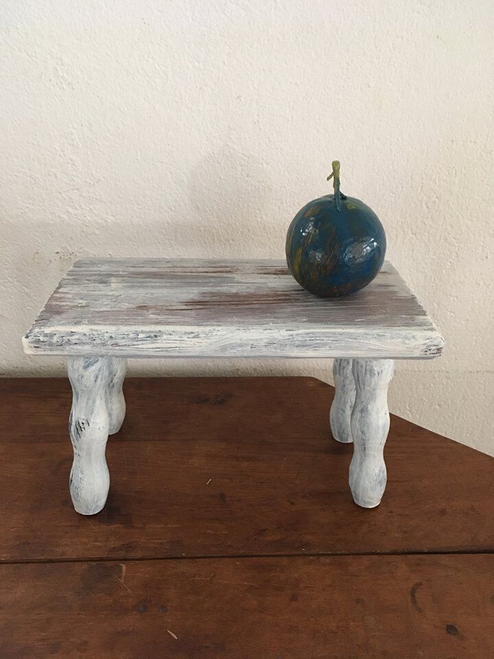 Wooden footrest in his white patina
