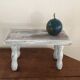 Wooden footrest in his white patina