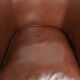 Comfortable cognac-coloured cow leather club armchair in English style