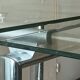 High table with tempered glass and chrome base.