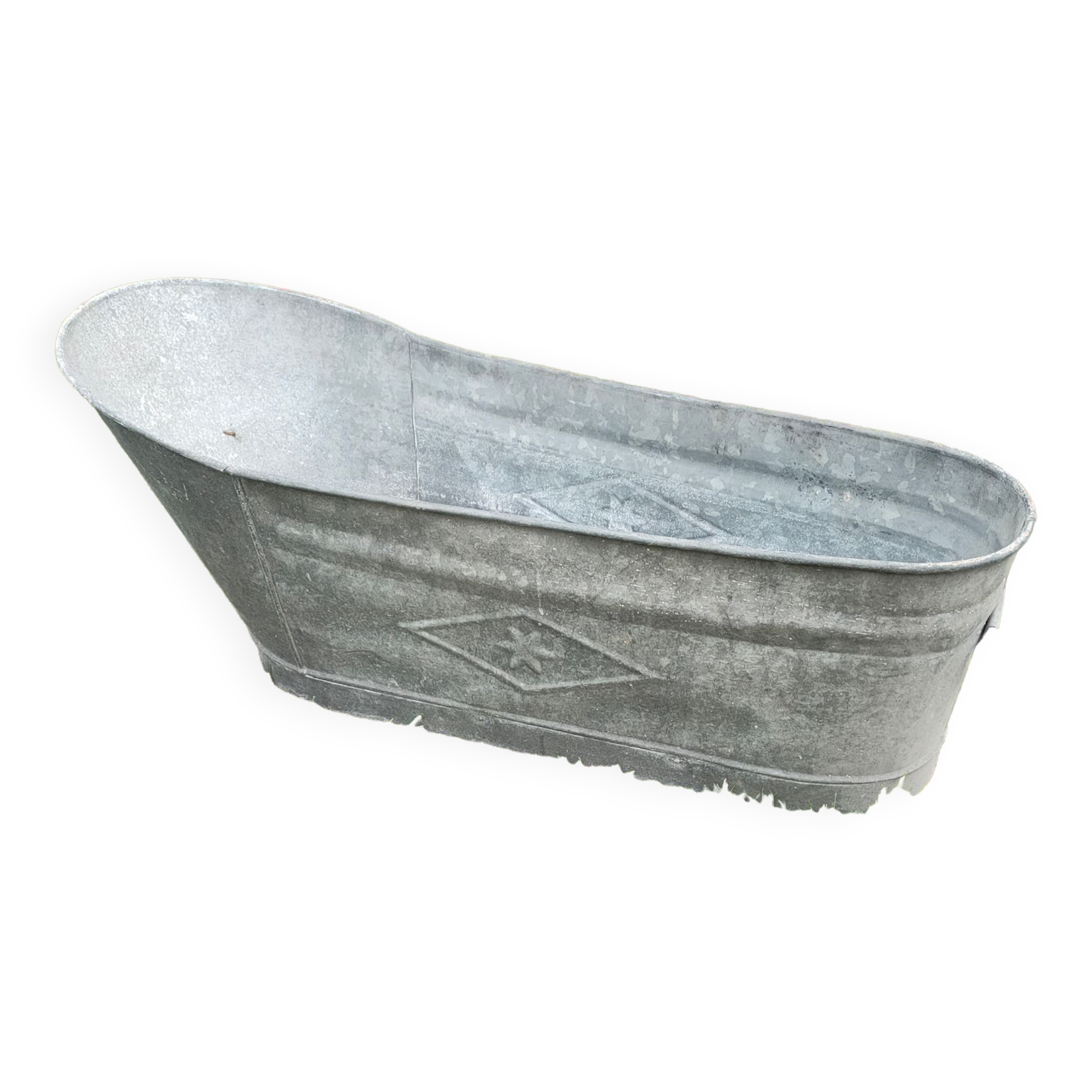 Antique children's bathtub in zinc